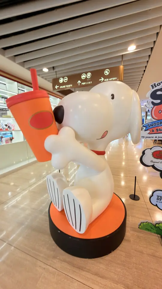 A giant Snoopy sculpture in a shopping mall