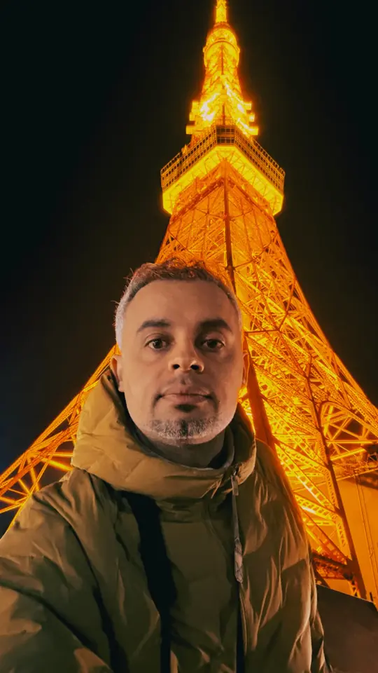 A selfie under Tokyo Tower at night